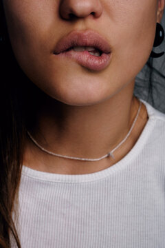 Woman biting her lips