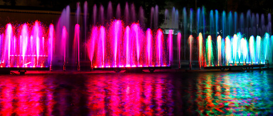 Multicolored fountain at night