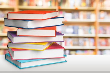 Stack of colorful books collection on the desk