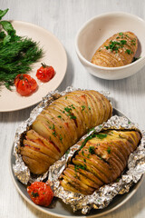 Baked potatoes on a peasant in foil