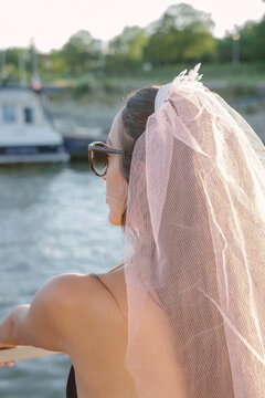 Woman With Pink Vail