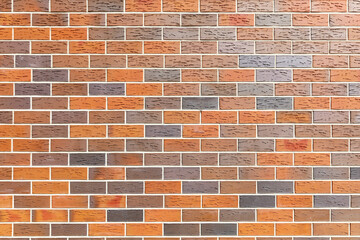 Red decorative brick in the wall as an  background.