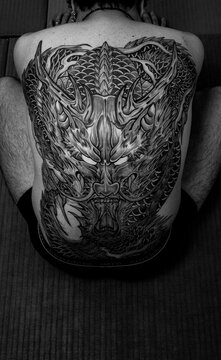 Japanese man with a Dragon tattooed on his back