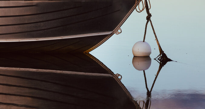 Small boat on a calm cool morning