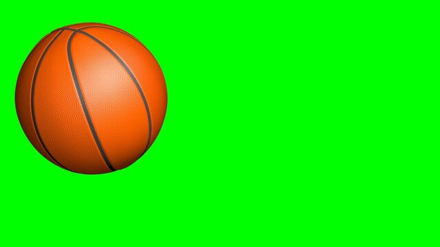 basketball rolls into frame isolated on green - 3d animation