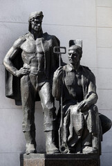 Sculptures in front of the entrance to the building of the Verkhovna Rada of Ukraine in the city of...