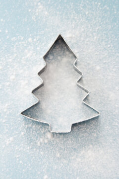 Christmas Tree Cookie cutter on blue background