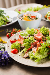 many beautiful dishes and salads for the buffet