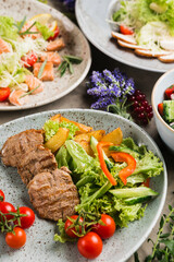 many beautiful dishes and salads for the buffet