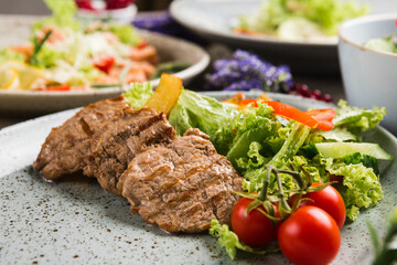 many beautiful dishes and salads for the buffet