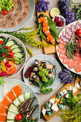 many beautiful dishes and salads for the buffet