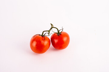 Top view. Tomatoes on the white background.