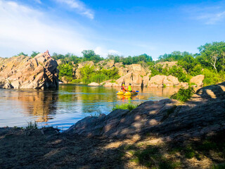 River rafting in a rocky gorge.