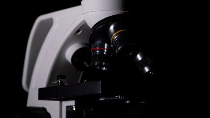 microscope for research and innovation on black background