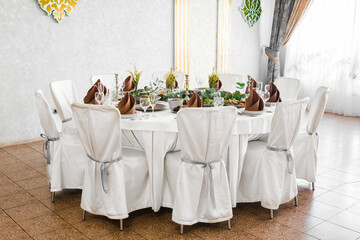 table setting with cutlery and dishes in the restaurant