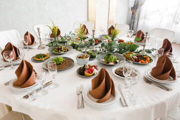 table setting with cutlery and dishes in the restaurant