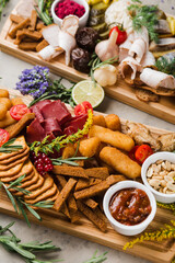 assortment of different snacks and nuggets for beer