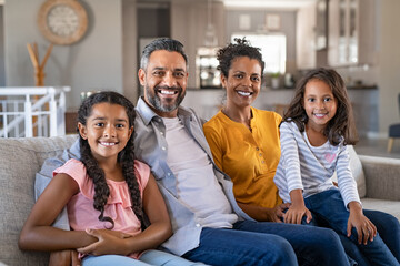 Happy multiethnic family sitting together