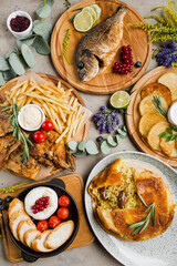 assortment of grilled meat and fish