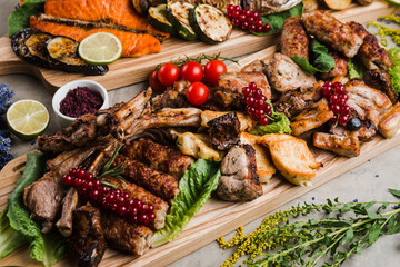 assortment of grilled meat and fish