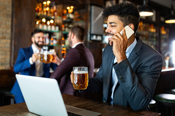 African american business man working with laptop in a restaurant