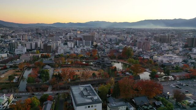 Aerial View 4k footage of Matsumoto Castle on morning in Matsumoto city, Nagano, Japan.