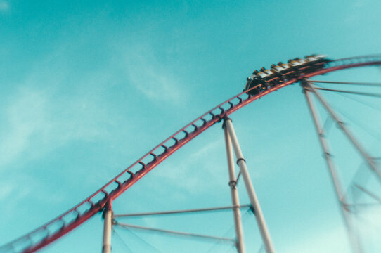 roller coaster against a blue sky
