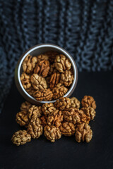 Walnut pieces inside in a porcelain bowl