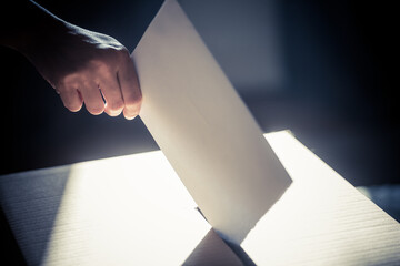Conceptual image of a person voting during elections