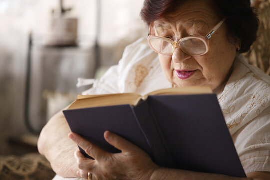 Senior woman reading a book