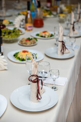 festive table for the reception of guests in the restaurant. Holiday. Table setting. Meal.