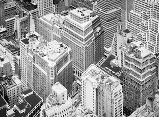 Black and white aerial view of New York City diverse architecture, USA.