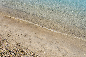 waves on the sand close up