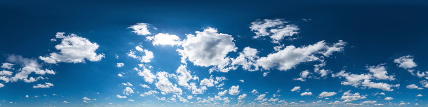 Seamless panorama with blue sky 360-degree view and beautiful clouds for use in 3D graphics as sky domes or for post-processing of drone shots