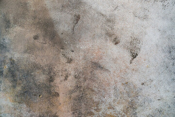 Texture of a gray wall with spots. Rough surface background. Old wall
