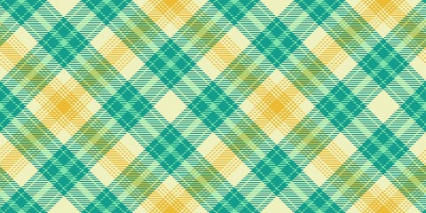 green sea on yellow colors diagonal tartan traditional clan ornament repeatable pattern, textile texture from plaid, tablecloths, shirts, clothes, dresses, bedding, blankets