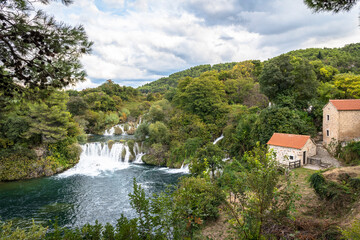Utility house and waterfall in Krka National Park in Croatia