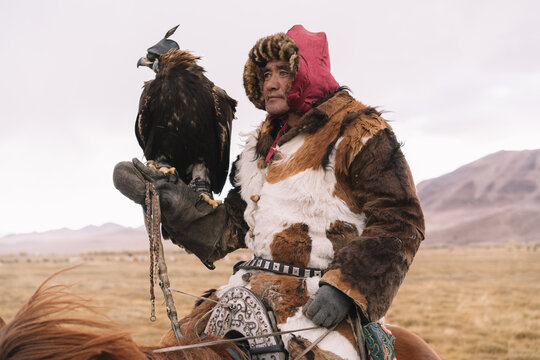 Falconer at Hunt