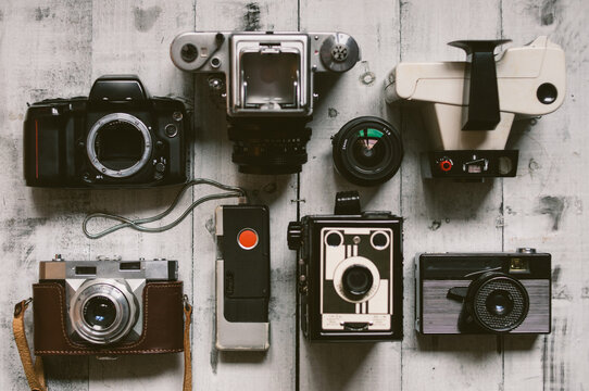 The Old Cameras on a White Board