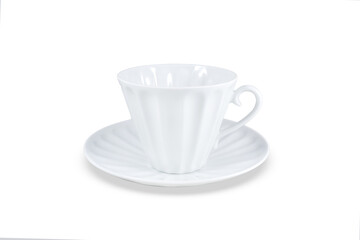 White cup and saucer for coffee or tea. Isolated on white background. Close-up.