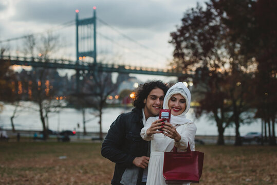 Cute Muslim couple taking a selfie