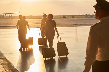 Experienced team of aircraft workers ready for the new journey