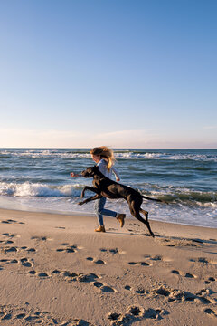 Girl Trying To Outrun Her Dog