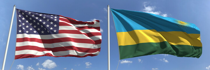 Flying flags of the USA and Rwanda on sky background, 3d rendering