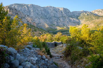 Summer hike in the mountains with evening light, croatia, zivogosce