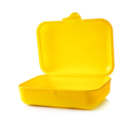 Empty yellow plastic lunch container