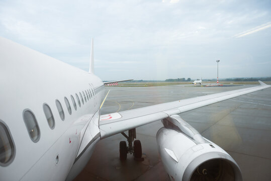 Airplane preparing for departure outdoor on the airfield