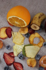 fruits chips on a wooden board