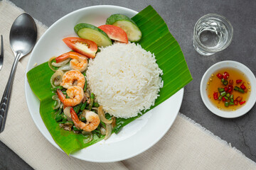 Thai food; Shrimp and squid fried cooked with long beans and rice.