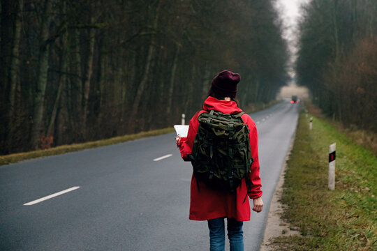 Back view of female with backpack